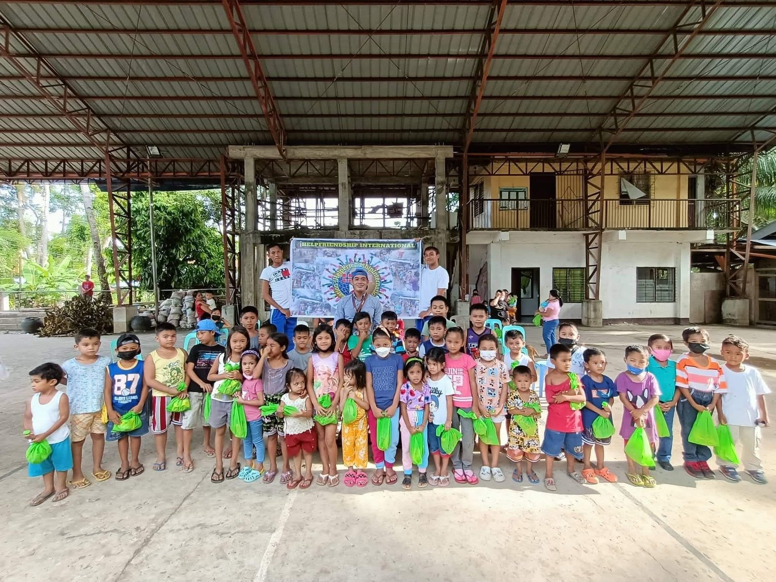 Group gathered for an ihelpfriendship community activity in Bohol
